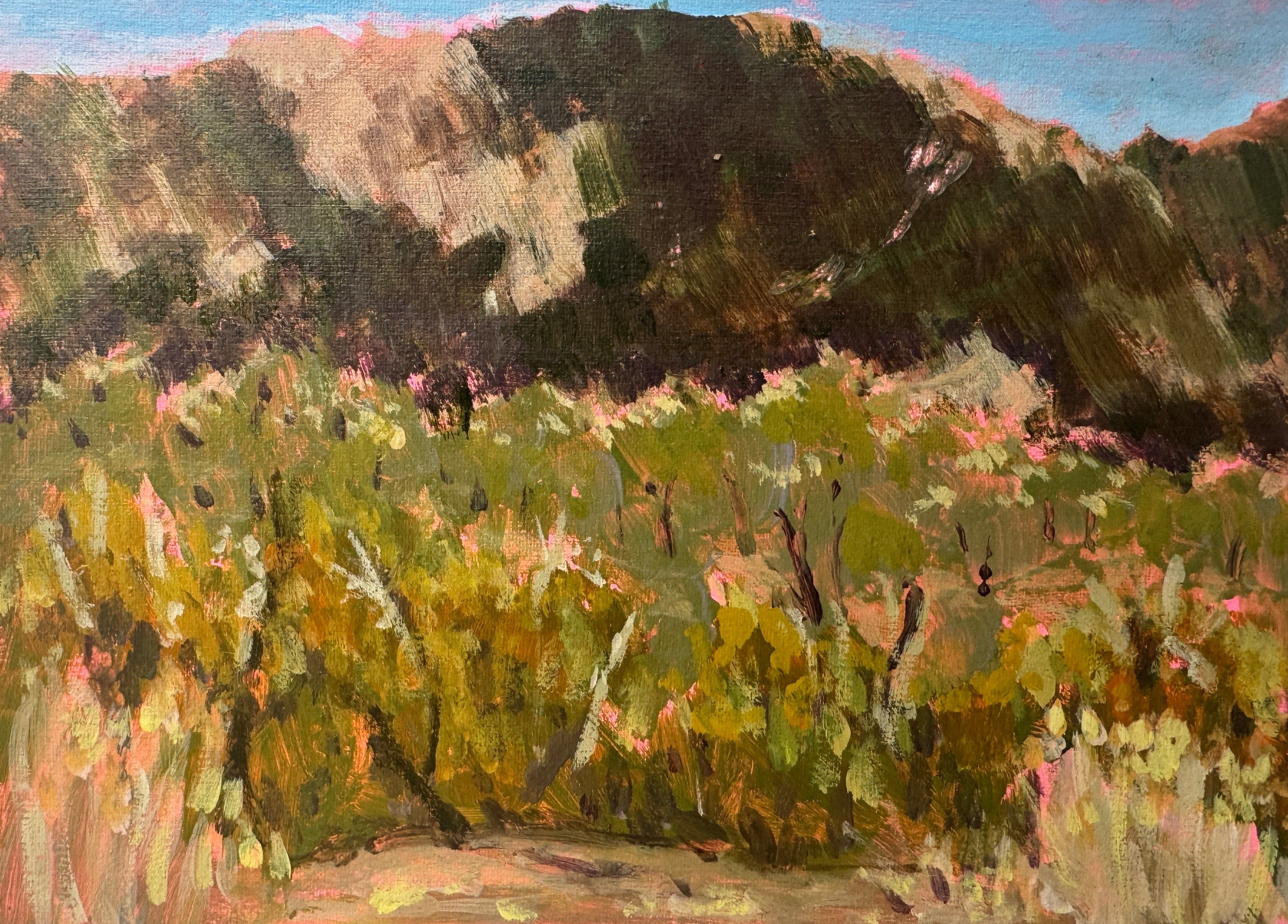 Painting of a landscape with greenery and mountains on a textured surface