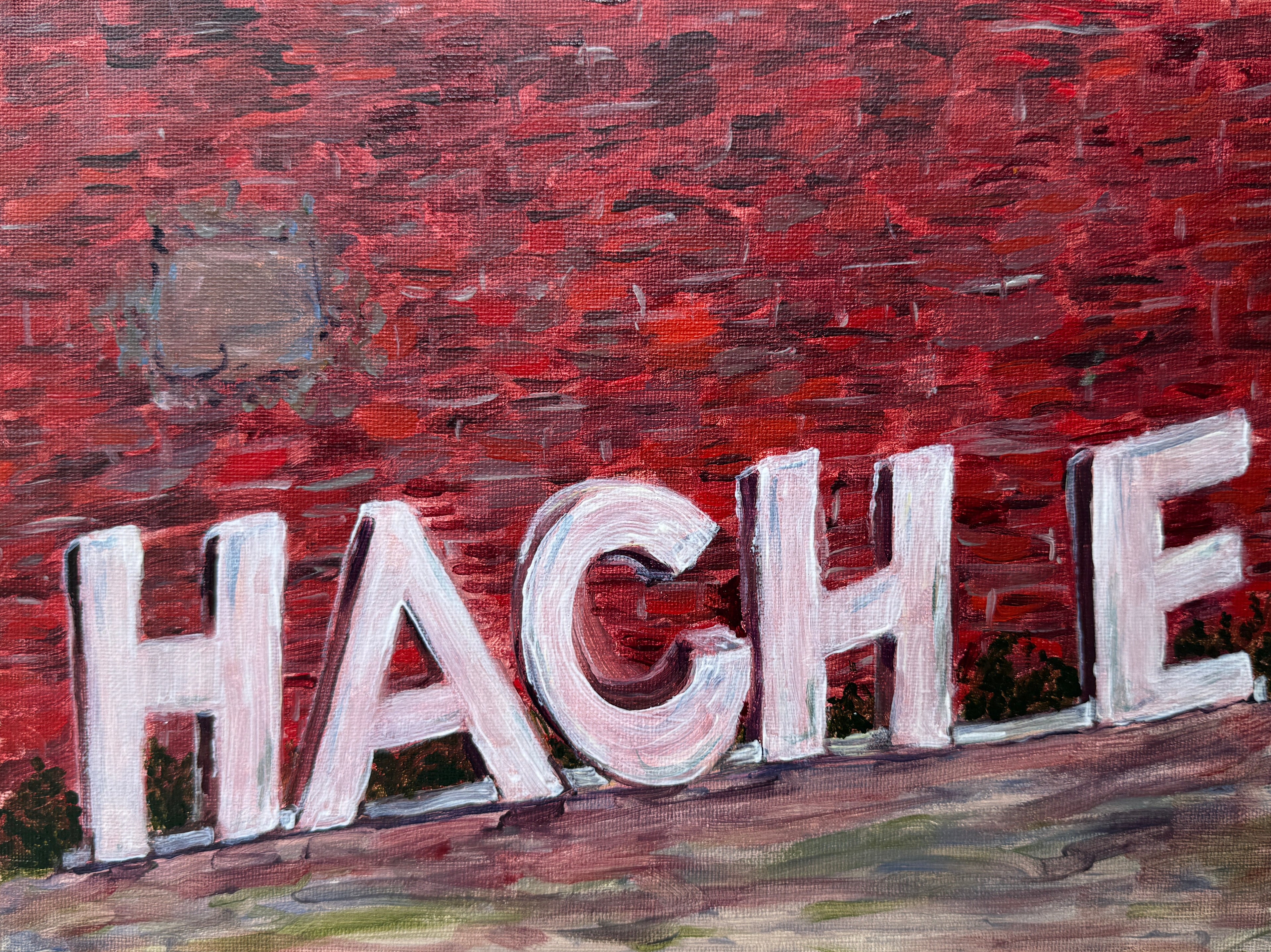 Painted sign with 'HACHE' on a textured red background