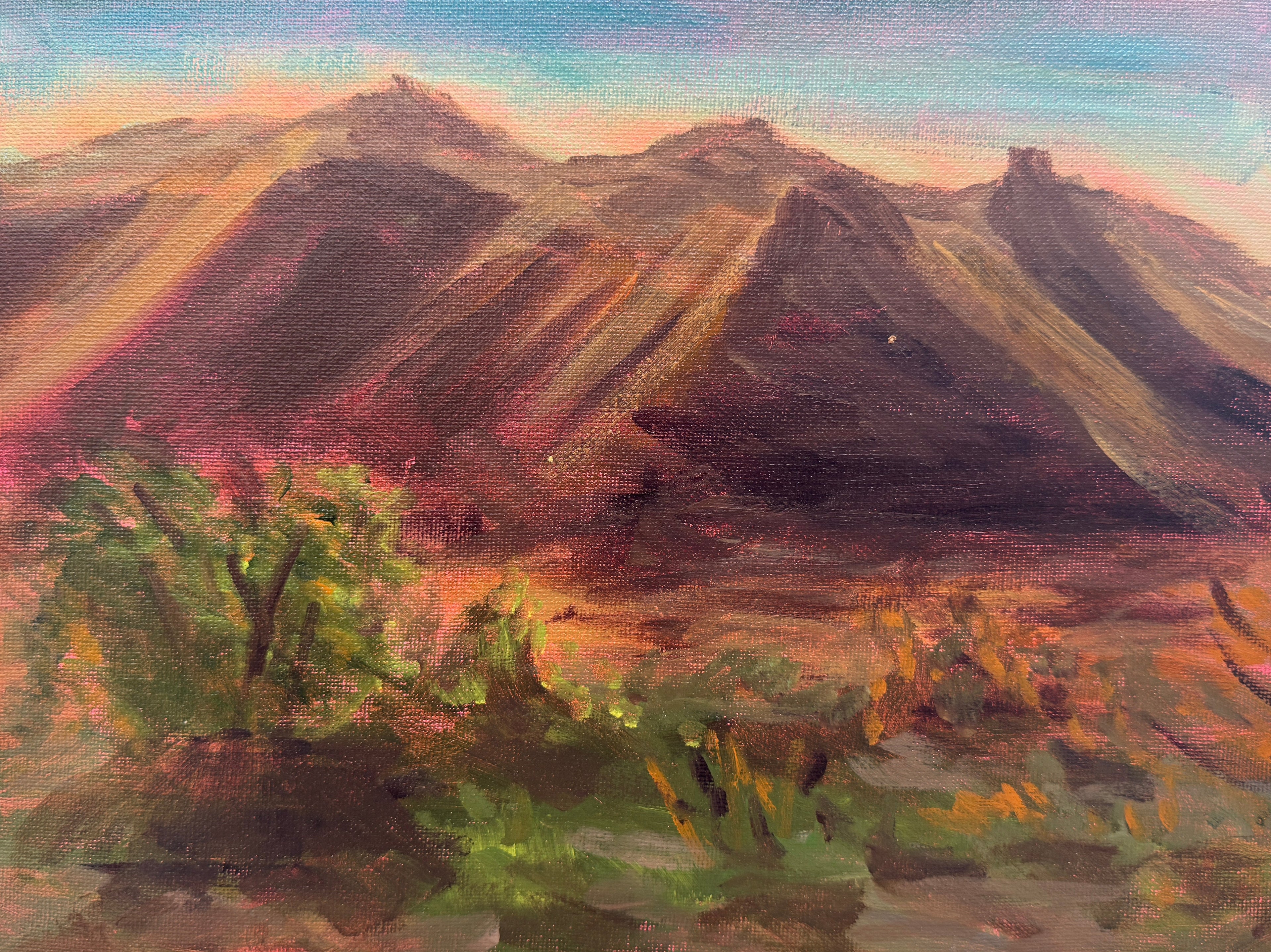 Painting of a mountain landscape with greenery on a textured surface