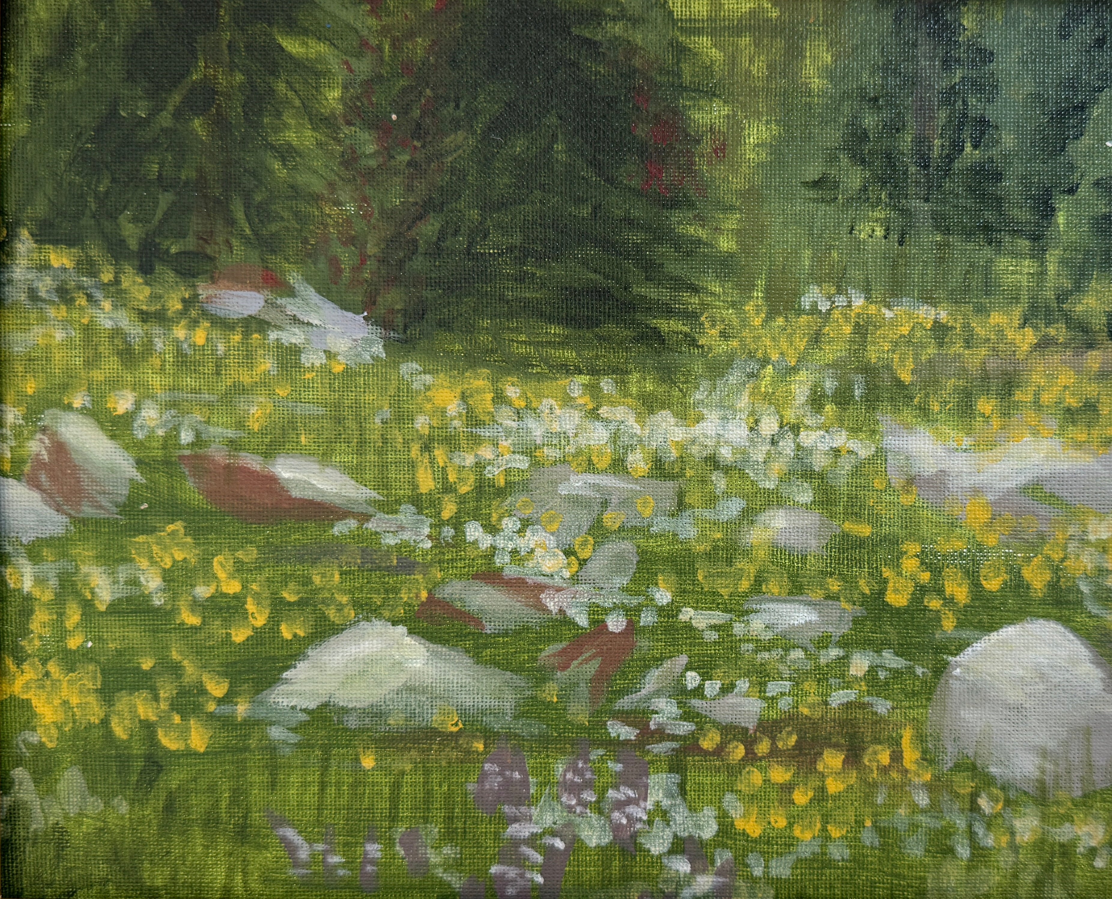 Framed painting of a landscape with flowers and rocks